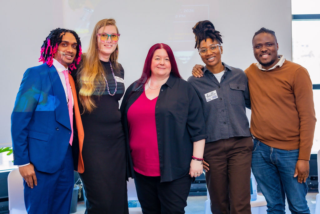 Panelists for the Tokenized or Recognized roundtable session pause for a group picture.